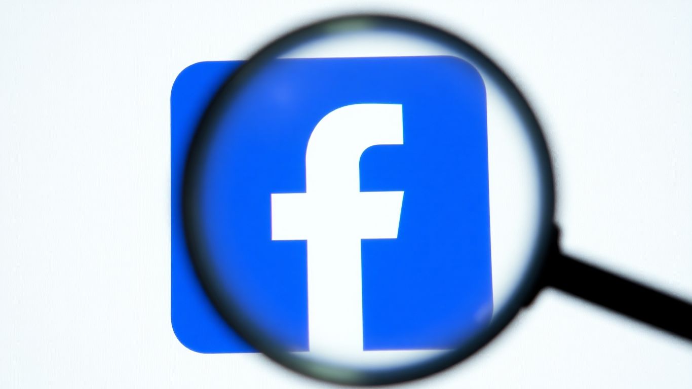 Facebook logo with magnifying glass highlighting quality content.