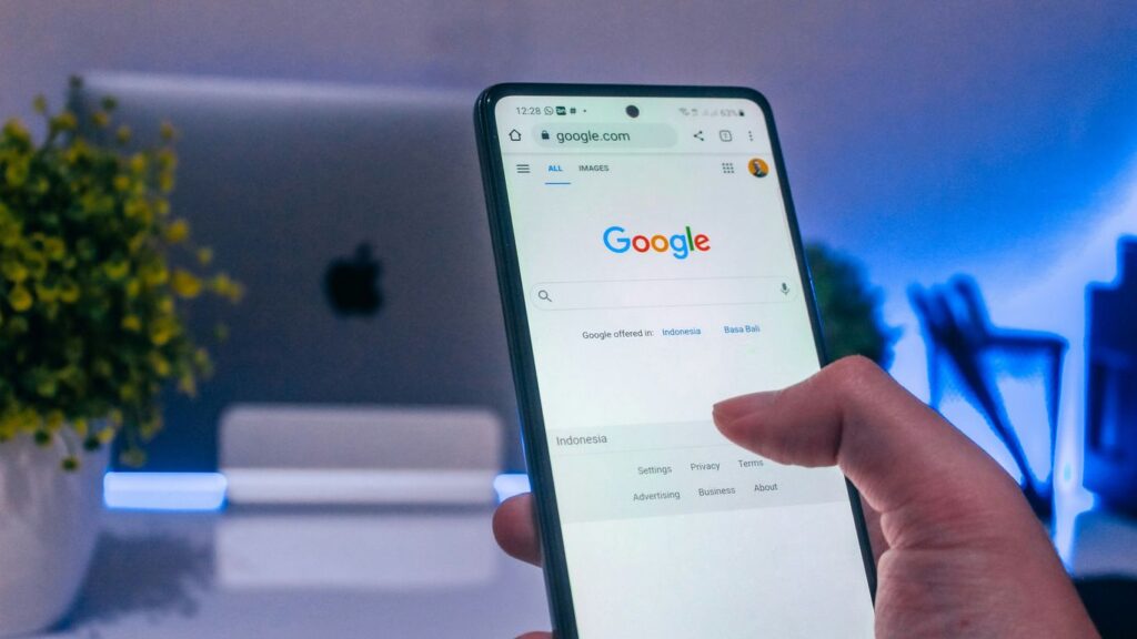 person holding white android smartphone