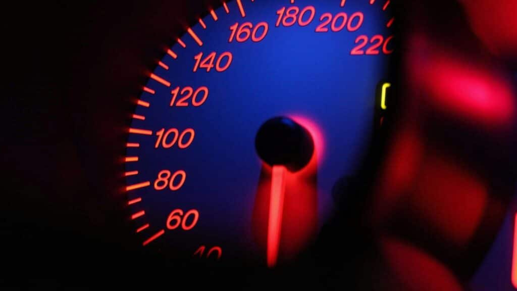 a close up of a speedometer in a car