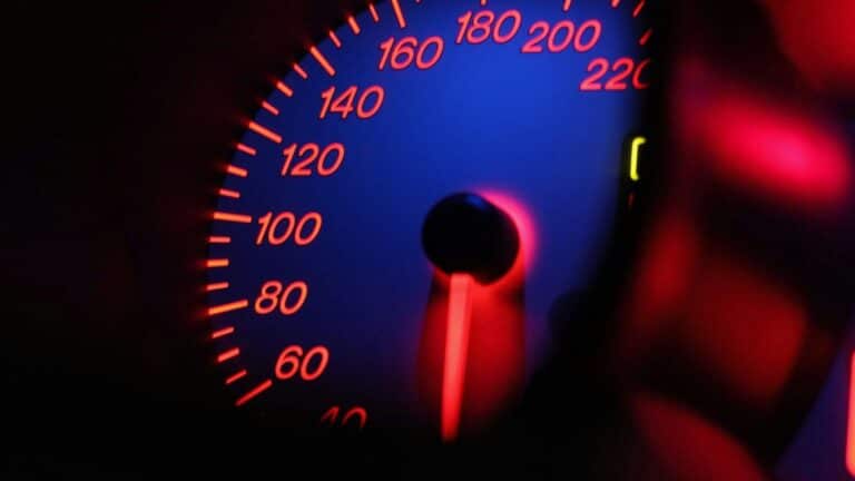 a close up of a speedometer in a car